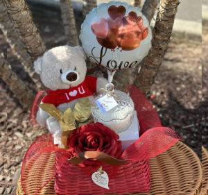 Lovely Gift basket of teddy bear (Love), candle, balloon and flowers