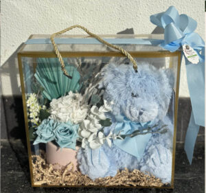 Blue Teddy Bear and Dried Flowers in Transparency Gift Bag