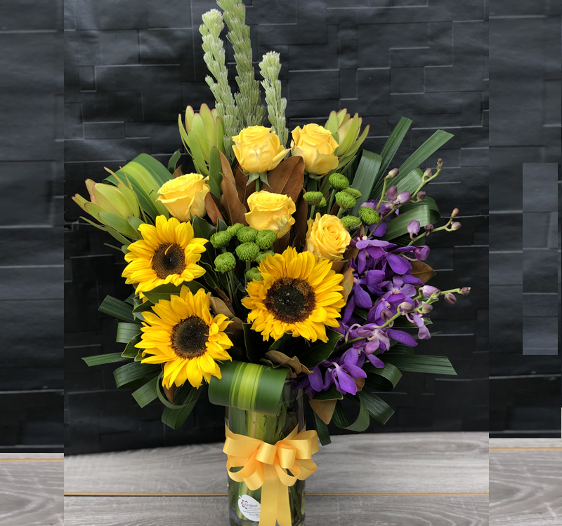 Glowing Sunflowers Vase arrangement